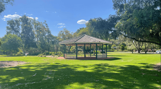 City of Belmont gazebo surrounded by manicured gardens and trees, ideal for photoshoots and bookable on SpacetoCo
